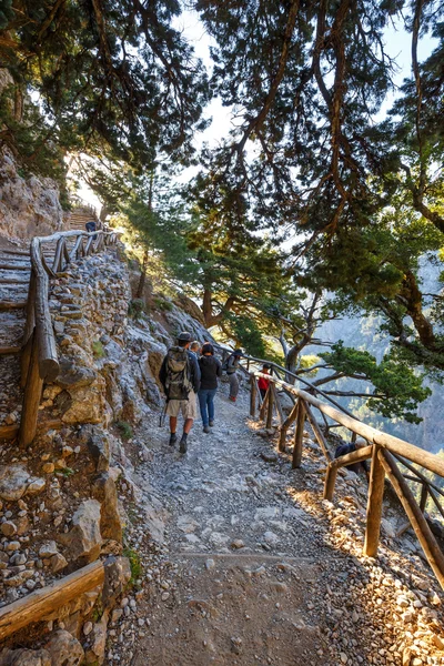 Samaria Gorge, Grece - MAY 26, 2016: Tourists hike in Samaria Gorge in central Crete, Greece. The national park is a UNESCO Biosphere Reserve since 1981