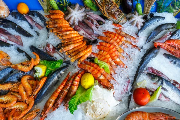 Fresh seafood in the fridge of the seafood restaurant in Crete, Greece