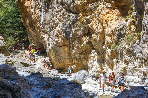 Samaria Gorge, Grece - MAY 26, 2016: Tourists hike in Samaria Gorge in central Crete, Greece. The national park is a UNESCO Biosphere Reserve since 1981