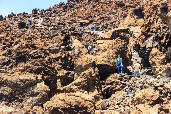 El Teide, Tenerife, June 06, 2015: Unidentified tourists are walking on the top of El Teide Volcano, Tenerife, Spain