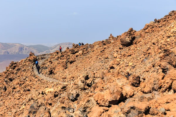 El Teide, Tenerife, June 06, 2015: Unidentified tourists are walking on the top of El Teide Volcano, Tenerife, Spain