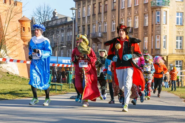 Krakow, Poland - December 31, 2015: 12th New Year\'s Eve Race in Krakow. The people running dressed in funny costumes