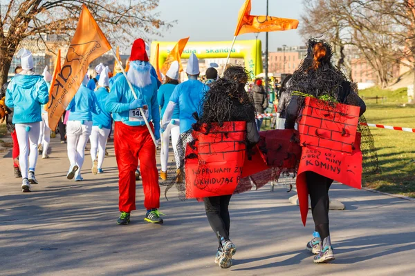 Krakow, Poland - December 31, 2015: 12th New Year\'s Eve Race in Krakow. The people running dressed in funny costumes