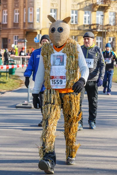 Krakow, Poland - December 31, 2015: 12th New Year\'s Eve Race in Krakow. The people running dressed in funny costumes