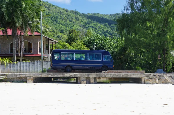 Small bus is typical for public transport at Praslin island