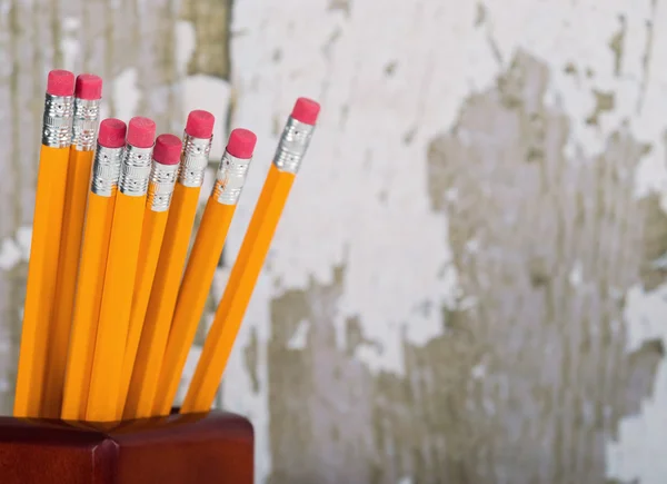 Group of yellow pencils in pencil holder