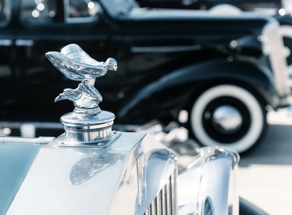 Hood ornament of 1937 Rolls Royce automobile
