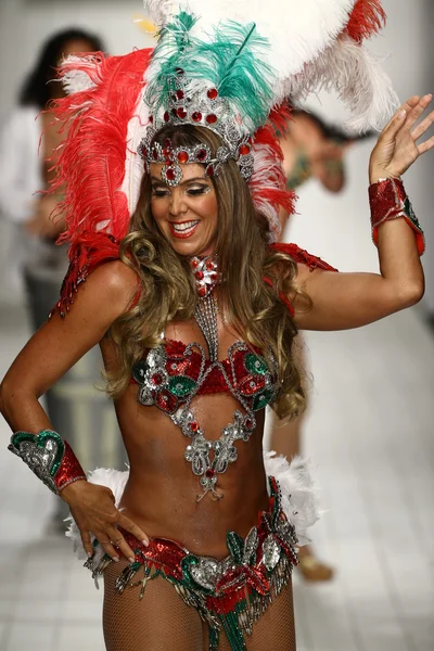 Brazilian dancers perform on runway