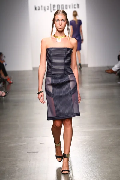 Model walks runway for Katya Leonovich Spring Summer 2015 fashion show