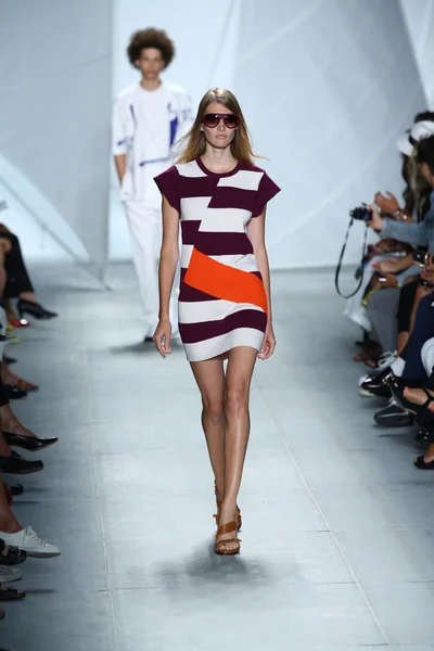 Model walks the runway at Lacoste during Mercedes-Benz Fashion Week