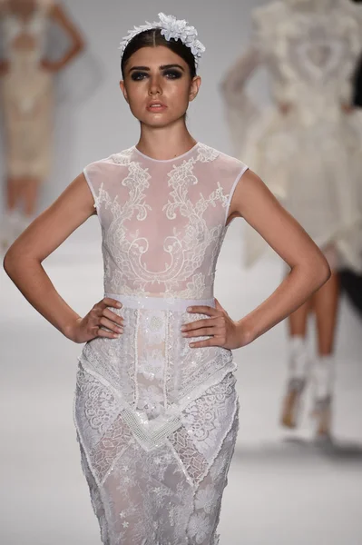 Model walks runway for Furne Amato Spring Summer 2015 presentation