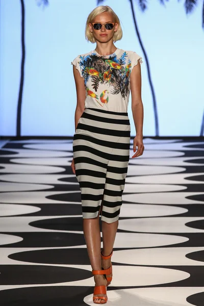 Model walks the runway at Nicole Miller during Mercedes-Benz Fashion Week
