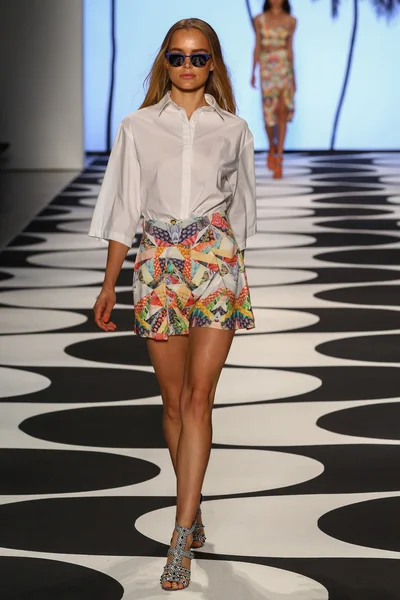 Model walks the runway at Nicole Miller during Mercedes-Benz Fashion Week