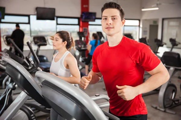 Man running on a treadmill