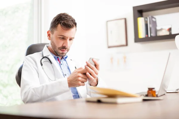 Physician using a smartphone