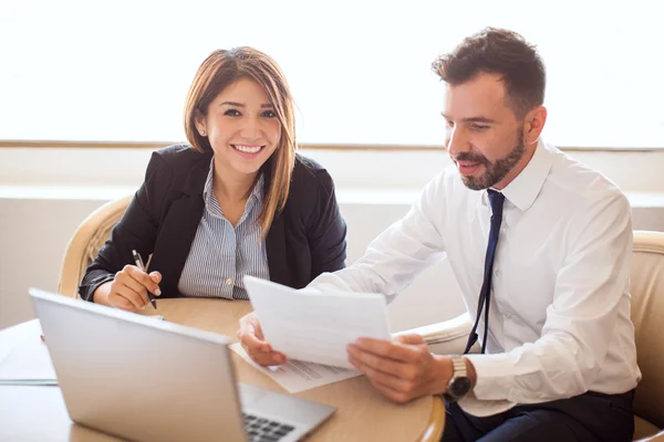 Executives reviewing some documents