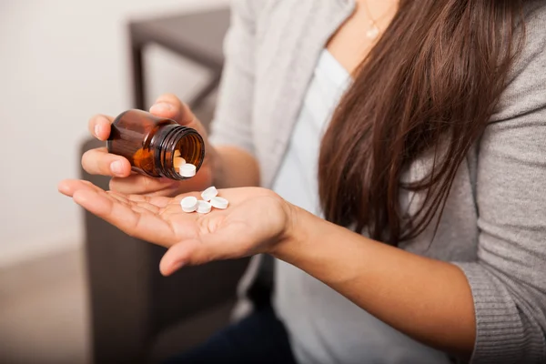 Woman\'s hands with pill bottle