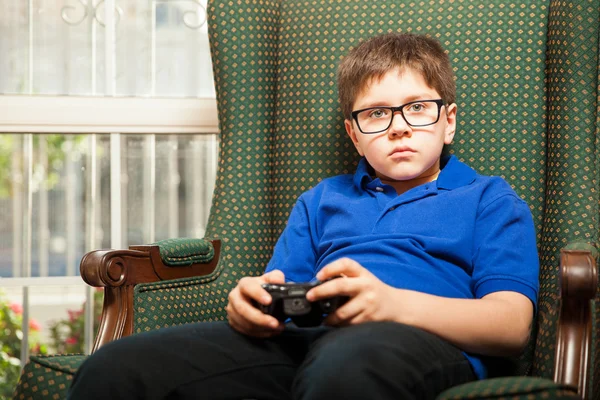 Boy Playing video games at home