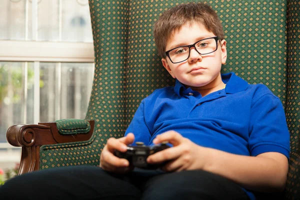 Boy holding a video game controller