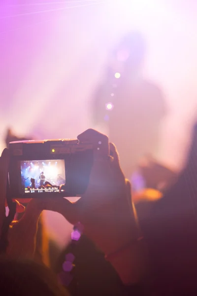 Silhouettes of people and musicians