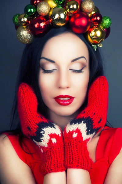 Woman wearing Christmas wreath