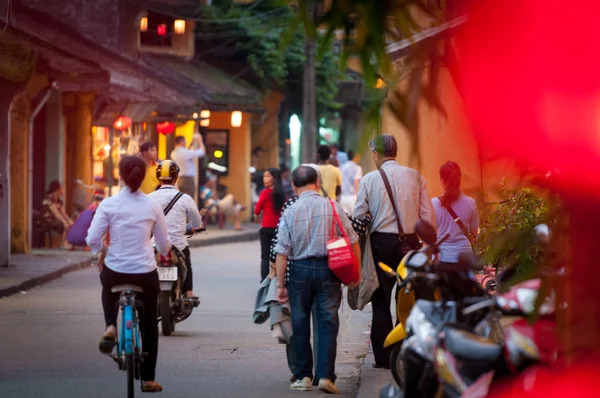 People on street of Hoi An, Vietnam, Asia.