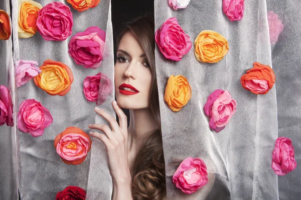 Beauty fashion model girl portrait with flowers. Beautiful luxury evening makeup and hair