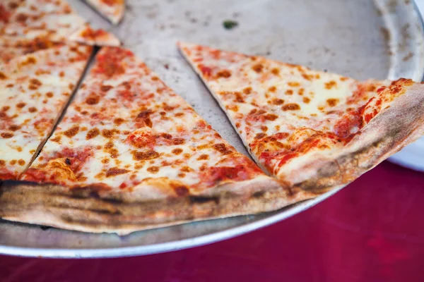 Close up of pizza in street fast food cafe