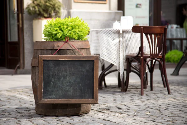 Empty menu board on street