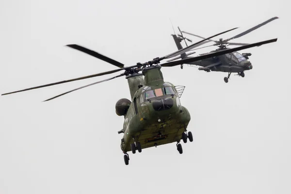 Chinook and Apache helicopter