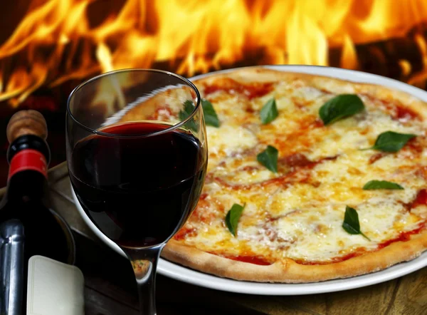 Pizza with glass of wine