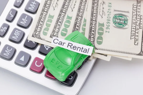 Car money and calculator With sign - Car Rental. Payments and costs.