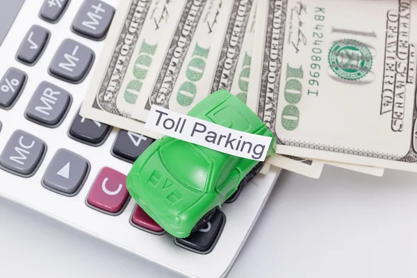 Car money and calculator With sign - Toll Parking. Payments and costs.