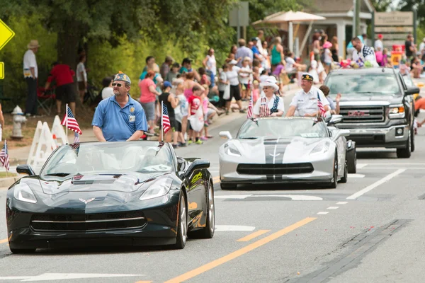 Veterans Ride In Convertibles At Old Soldiers Day Parade