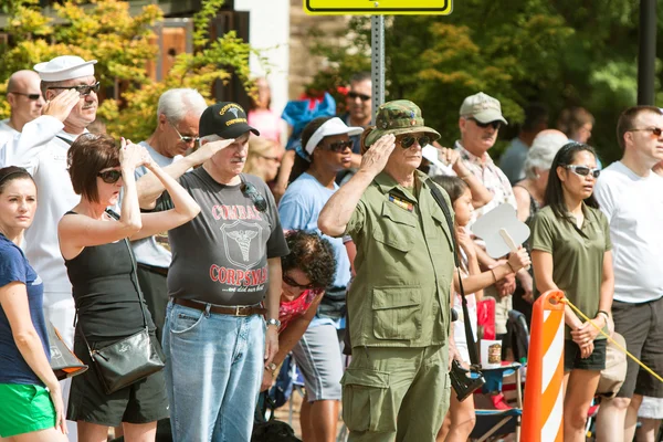 Combat Veterans Salute American Flag At Old Soldiers Day Parade