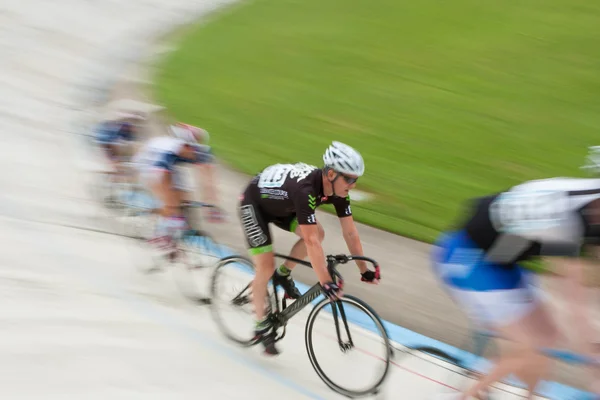 Group Of Cyclists Motion Blur In Race At Atlanta Velodrome