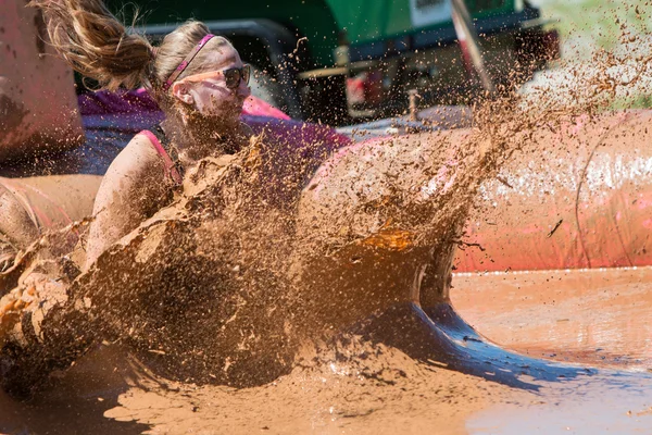 Woman Creates Huge Muddy Splash At Dirty Girl Mud Run