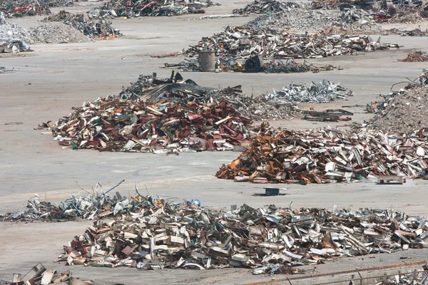 Piles Of Twisted Metal And Debris Litter A Demolition Site