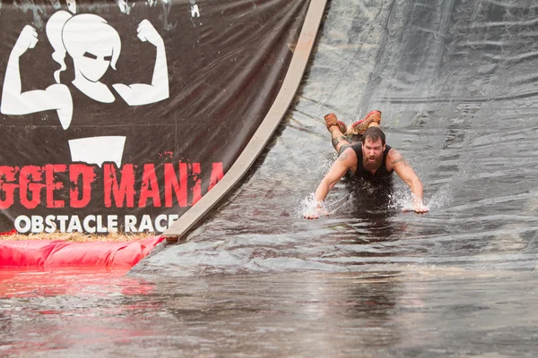 Man Goes Headfirst Down Water Slide In Obstacle Course Race