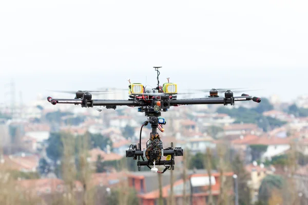 Drone hexacopter over the city