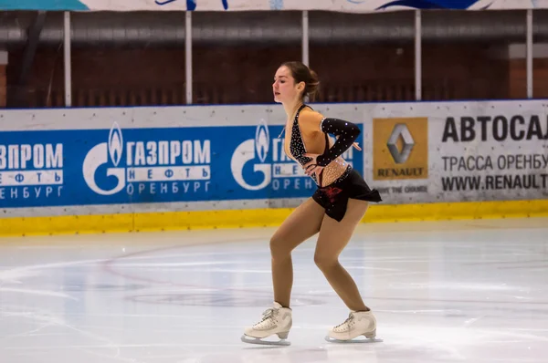 Girl figure skater in singles skating