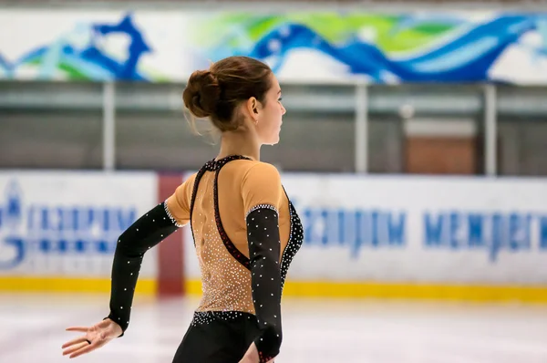 Girl figure skater in singles skating