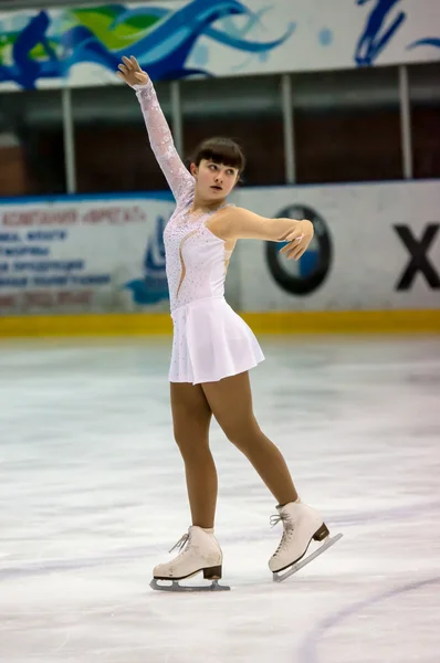 Girl figure skater in singles skating.