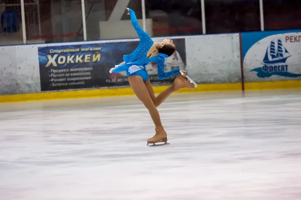 Girl figure skater in singles skating.