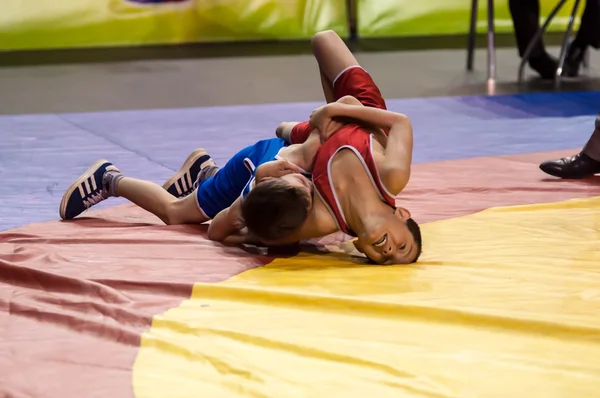 The boys compete in Greco-Roman wrestling, Orenburg, Russia