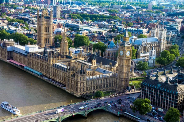Aerial view of London  with houses of Parliament , Big Ben and  Westminster Abbey . England