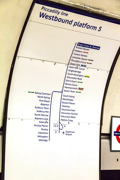 Nformation about  movement of trains on the Piccadilly line  from the King Cross St. Pancras underground station, Westbound platform 5 . London. UK