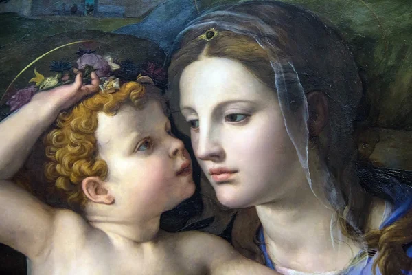 Madonna and Child with Saints (1540)  by Bronzino at the National Gallery of London.