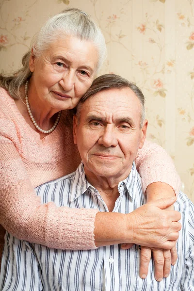 Portrait of smiling elderly couple Old people holding hands. Senior man, woman.