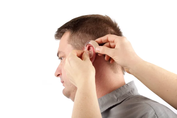 Iserting a hearing aid